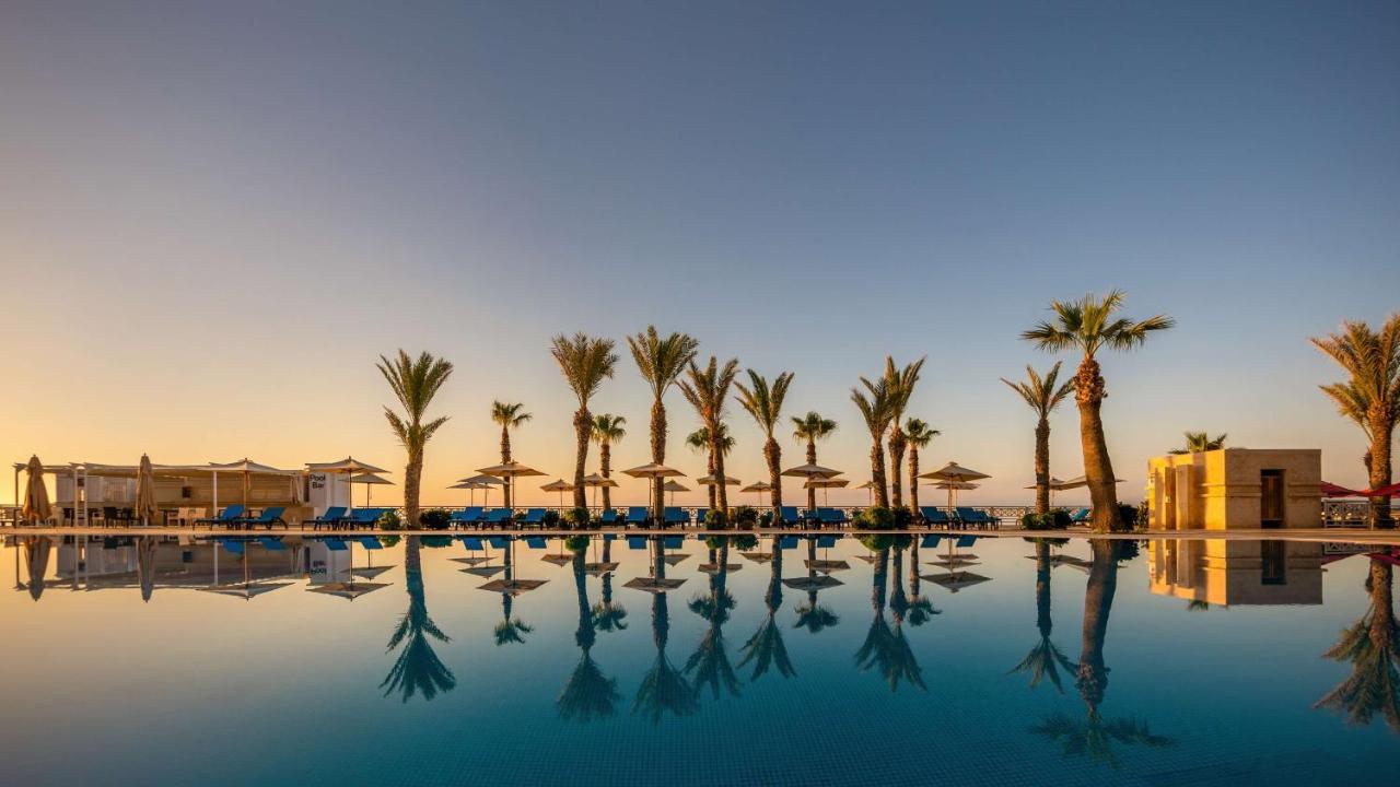 فندق راديسون بلو ريسورت آند ثالاسو الحمامات المظهر الخارجي الصورة The pool at the Royal Beach Palace